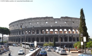 Drive Italy! Cars and buses along the Coloseum in Rome