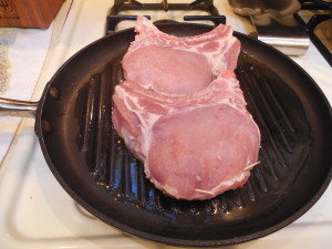 Skillet with pork chops 