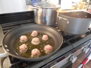 Fry Italian meatballs in olive oil