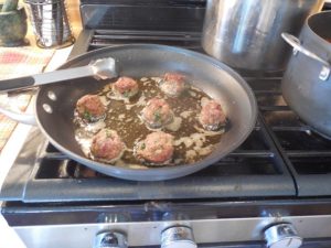 Italian meatballs turned in olive oil