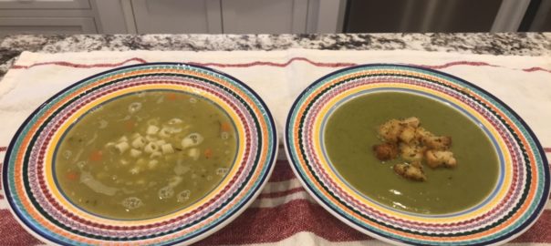 Two bowls of split pea soup. The bowl on the left has ditalini pasta and the bowl on the right is garnished with croutons.